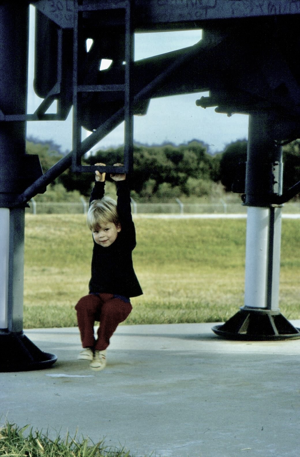 Young Mark hanging from a rocket